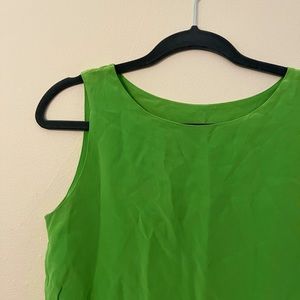 Used but good. Beautiful color and satin fabric